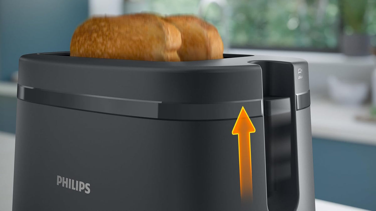 Philips Essentials Collection Toaster 1000 Series HD2510/90 with two slots for bread, black finish and control buttons on top.
