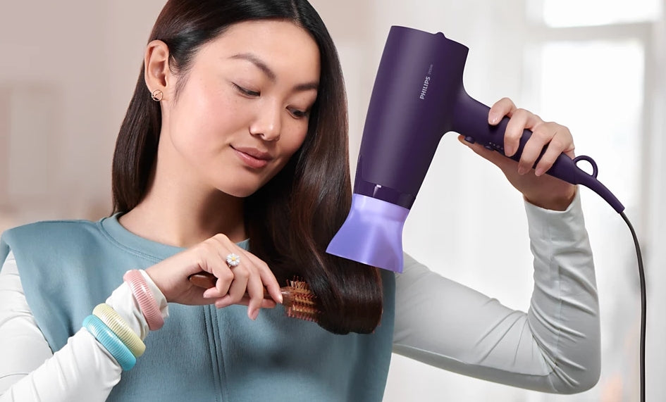 Taghareed Philips 3000 Series purple hair dryer with ThermoProtect attachment and 6 heat/speed settings.
