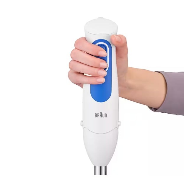 Taghareed Braun MultiQuick 3 hand blender in white with blue accents, featuring a soft grip handle and dual speed control buttons.
