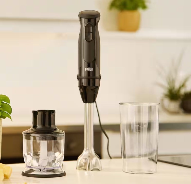 Taghareed Braun MultiQuick 3 hand blender in black with stainless steel shaft, chopper, and measuring cup.