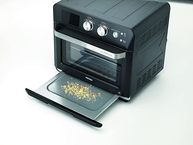 Taghareed Kenwood 25L black 2-in-1 air fryer oven with digital display and 1700W power.