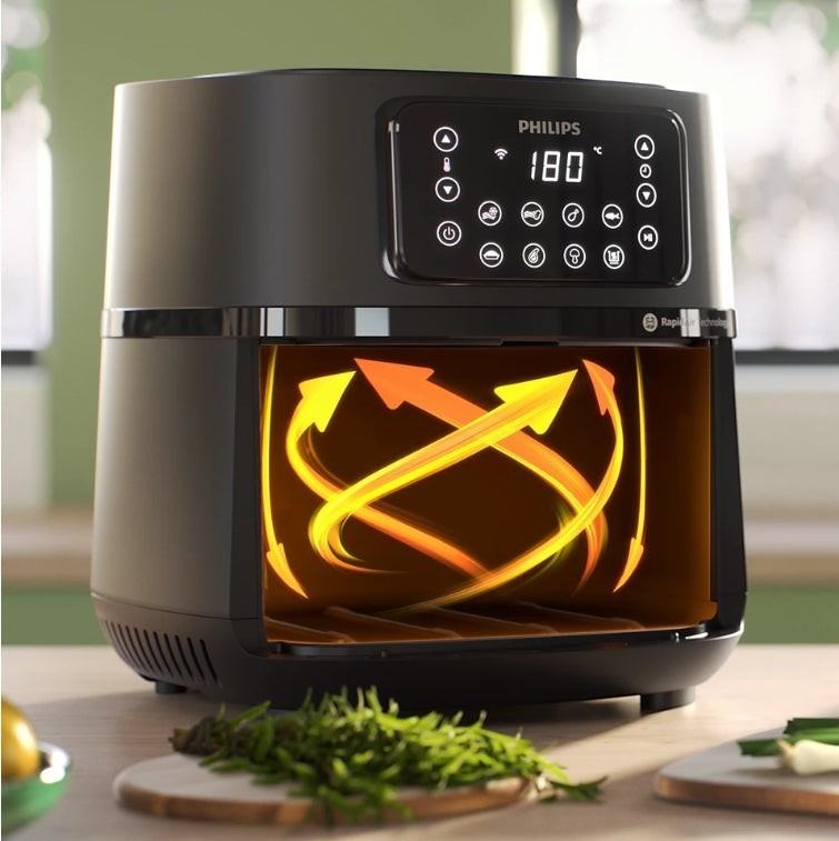 Taghareed Philips Airfryer 5000 Series XXL Connected HD9285/93, black, 7.2L capacity, digital display, Rapid Air technology for crispy food.