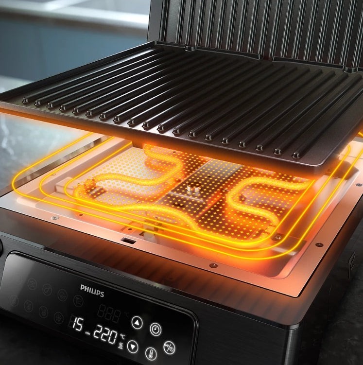 Taghareed Philips 7000 Series contact grill with digital controls and 8 preset programs. Features non-stick plates and 180-degree opening.