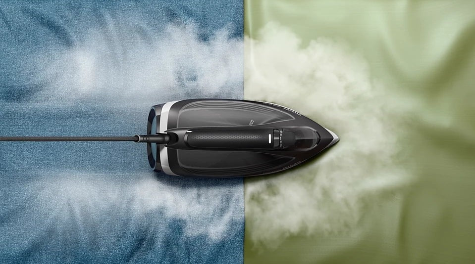 Taghareed Philips 6000 Series steam iron with 2600W power, SteamGlide Plus soleplate, and OptimalTEMP technology.