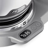 Digital kitchen scale with digital display on a white background