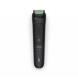 Taghareed Philips Multigroom Series 3000 MG3930/15 all-in-one trimmer with 7 attachments, including beard combs, nose trimmer, and USB charging cable.