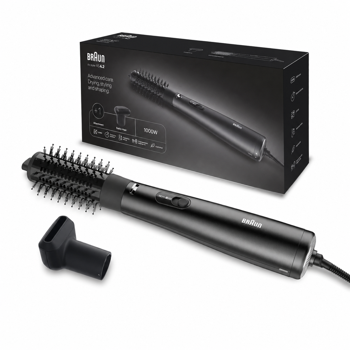 Braun hair styling brush with a round brush attachment and a nozzle attachment, shown in front of its black retail box on a white background.