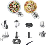 Collection of kitchen blender attachments with two plates of food on a white background