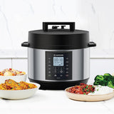 NutriCook pressure cooker with plates of food on a white background