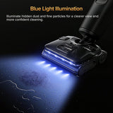 Vacuum cleaner with blue light illumination on a dark background