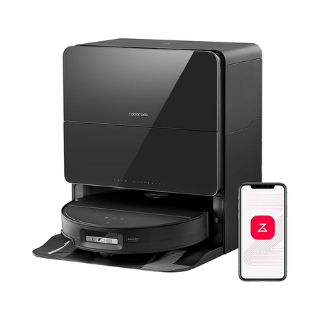 A black robotic vacuum cleaner docked in its matching charging station, shown on a clean white background with a smartphone displaying a companion app on the right.