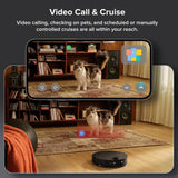 Promotional graphic for a smart home device showing a black robotic vacuum cleaner in a living room with a cat on a rug, plus an overlaid smartphone screen preview and feature text reading 'Video Call & Cruise'.