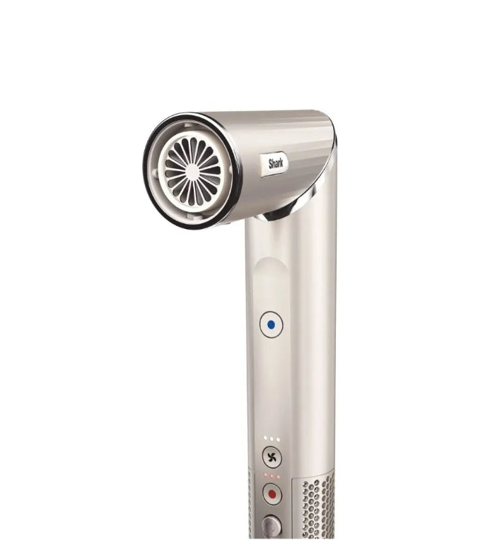 A sleek handheld hair dryer in a metallic silver finish, featuring a circular front grille with a black center and a small 'Bairi' brand label. The body has a blue power button and other control buttons, set against a plain white background.