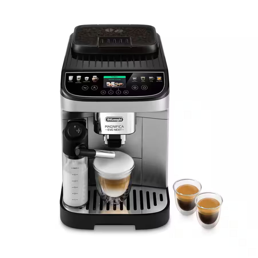Taghareed De'Longhi Magnifica Evo fully automatic coffee machine in silver and black, with milk carafe and two espresso cups.
