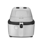 Taghareed De'Longhi MultiFry One white air fryer and multi-cooker with black accents and two control knobs.