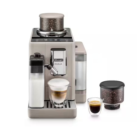 Taghareed De'Longhi Rivelia automatic coffee machine in beige with dual bean hoppers, milk carafe, and a latte macchiato.