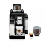 Taghareed De'Longhi Rivelia automatic coffee machine in black with dual bean hoppers, milk carafe, and two coffee cups.