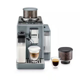 Taghareed De'Longhi Rivelia automatic coffee machine in grey with dual bean hoppers, milk carafe, and espresso cups.