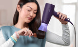 Taghareed Philips 3000 Series purple hair dryer with ThermoProtect attachment and 6 heat/speed settings.