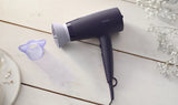 Taghareed Philips 3000 Series purple hair dryer with ThermoProtect attachment and 6 heat/speed settings.
