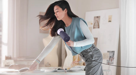 Taghareed Philips 3000 Series purple hair dryer with ThermoProtect attachment and 6 heat/speed settings.