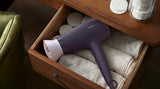 Taghareed Philips 3000 Series purple hair dryer with ThermoProtect attachment and 6 heat/speed settings.