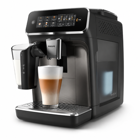 Taghareed Philips 3300 Series fully automatic espresso machine with LatteGo milk system, making a layered latte.