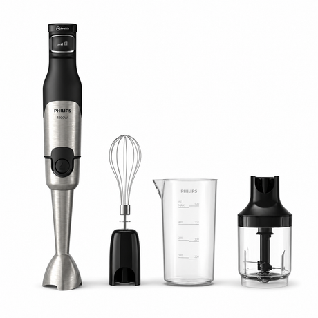 Taghareed Philips 5000 Series hand blender in silver and black, with whisk, beaker, and chopper attachments.