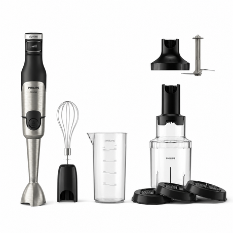 Taghareed Philips 5000 Series hand blender in silver and black with whisk, chopper, beaker, and food processor attachments.