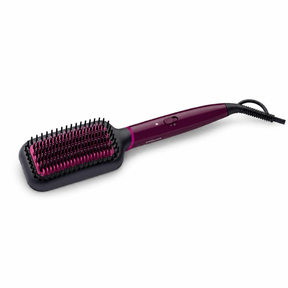 Taghareed Philips 5000 Series heated straightening brush in plum with keratin-infused ceramic coating and ThermoProtect technology.