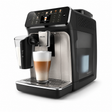 Taghareed Philips 5500 Series fully automatic espresso machine with LatteGo system, brewing a latte macchiato. Features a TFT display and ceramic grinder.