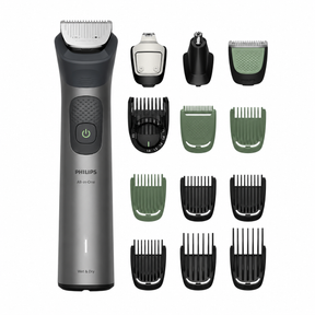 Taghareed Philips All-in-One Trimmer 7000 Series MG7922/15 with 13 attachments for beard, hair, and body grooming. Includes various combs and heads.
