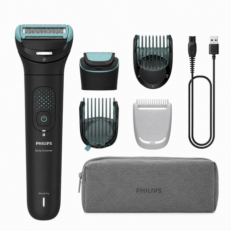 Taghareed Philips Body Groomer 7000 Series BG7470/15, black with teal accents, includes trimmer, guards, USB cable, and pouch. Wet & Dry use.