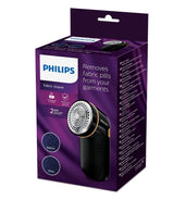 Taghareed Philips Fabric Shaver GC026/80, black with gold accents, includes batteries and cleaning brush.