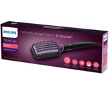 Taghareed StyleCare Essential Heated Straightening Brush with paddle head and purple bristles.