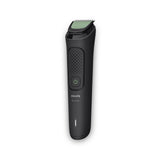Taghareed Philips Multigroom Series 3000 MG3930/15 all-in-one trimmer with 7 attachments, including beard combs, nose trimmer, and USB charging cable.