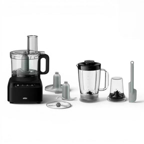 Braun PurEase Food Processor FP3132BK in black, featuring a compact design with multiple attachments including a blender jug, chopping blade, and slicing disc.