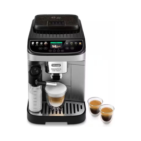A De'Longhi Magnifica Evo coffee machine in black and silver, shown with a cup of espresso with milk and two small double-walled cups of espresso on a white background.