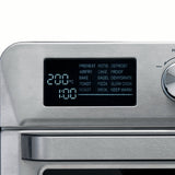 Taghareed Kenwood 25L 1700W stainless steel 2-in-1 air fryer oven with digital display and 15 cooking programs.