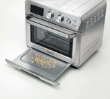 Taghareed Kenwood 25L 1700W stainless steel 2-in-1 air fryer oven with digital display and 15 cooking programs.