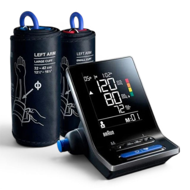 Braun upper arm blood pressure monitor with two cuffs (large and small) and a digital display showing readings and a color-coded indicator.
