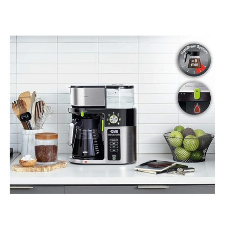Taghareed Braun BrewSense Drip Coffee Maker KF9050BK, black and stainless steel, with 10-cup glass carafe and digital display.