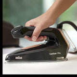 Braun CareStyle 7 Pro steam generator iron in black with copper accents, featuring FreeGlide 3D technology and iCare Mode.