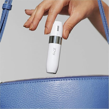 Taghareed Braun Face Mini Hair Remover FS1000, white, compact, portable, for gentle facial hair removal.