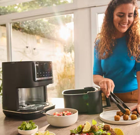 Taghareed Braun MultiFry 5 Air Fryer 2-in-1 HF5050IBK, black, 6L capacity, 2000W, with digital display and 15 auto programs.