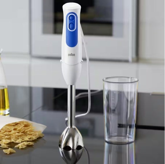 Taghareed Braun MultiQuick 3 hand blender, white with blue accents, stainless steel shaft, and dual speed control buttons.