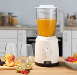 Taghareed Braun PowerBlend 1 JB1000 white blender with orange juice, 2 speed settings, ice crush function.
