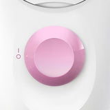 Taghareed Braun Silk-épil 1 epilator in white and pink with a pink control dial and on/off indicator.