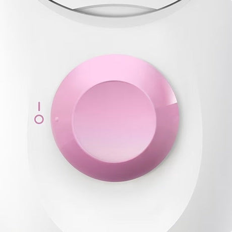Taghareed Braun Silk-épil 1 epilator in white and pink with a pink control dial and on/off indicator.