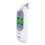 Taghareed Braun ThermoScan 7 ear thermometer with Age Precision technology, digital display showing 37.0 degrees Celsius.